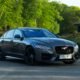 black jaguar a 4 coupe on road during daytime