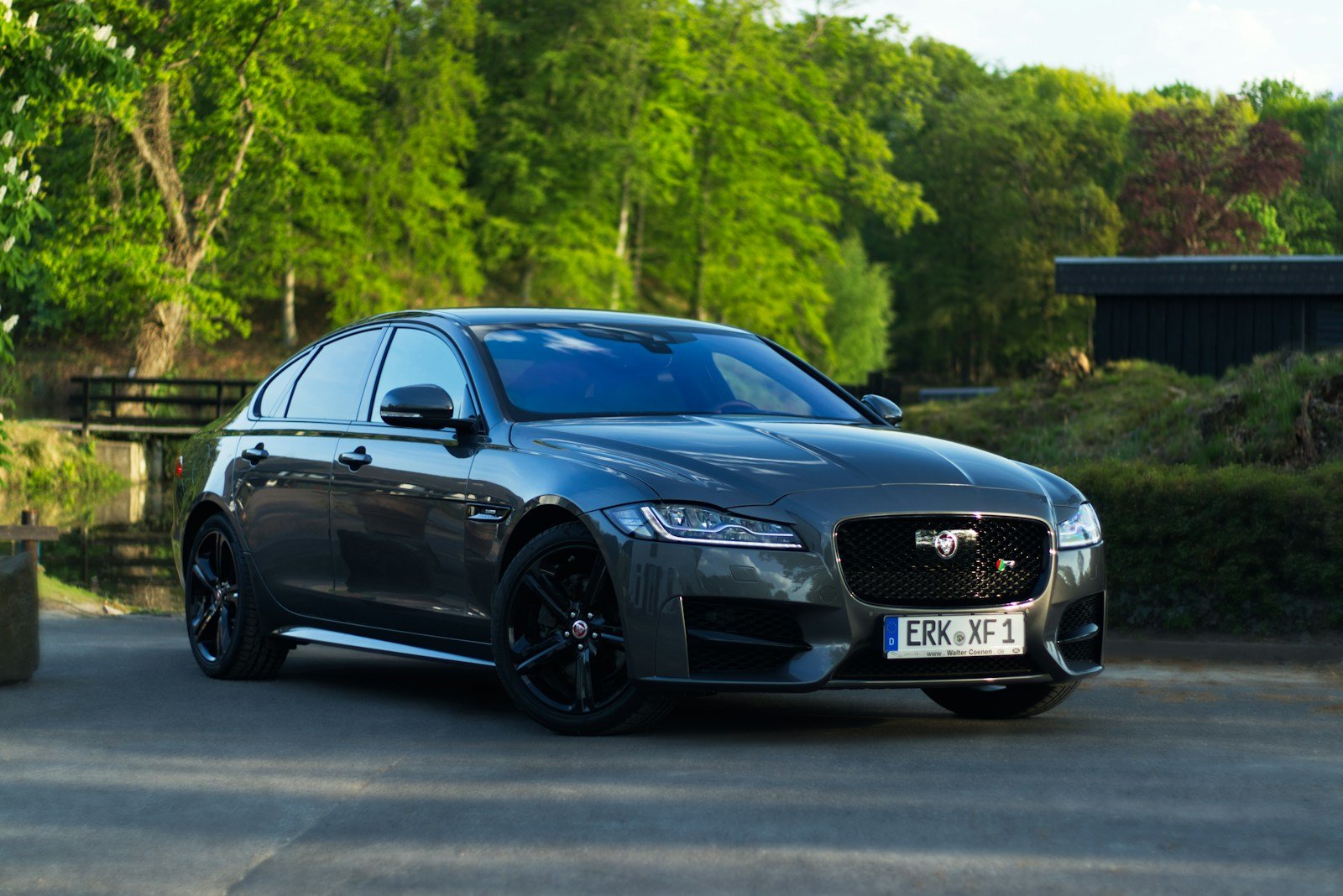 black jaguar a 4 coupe on road during daytime