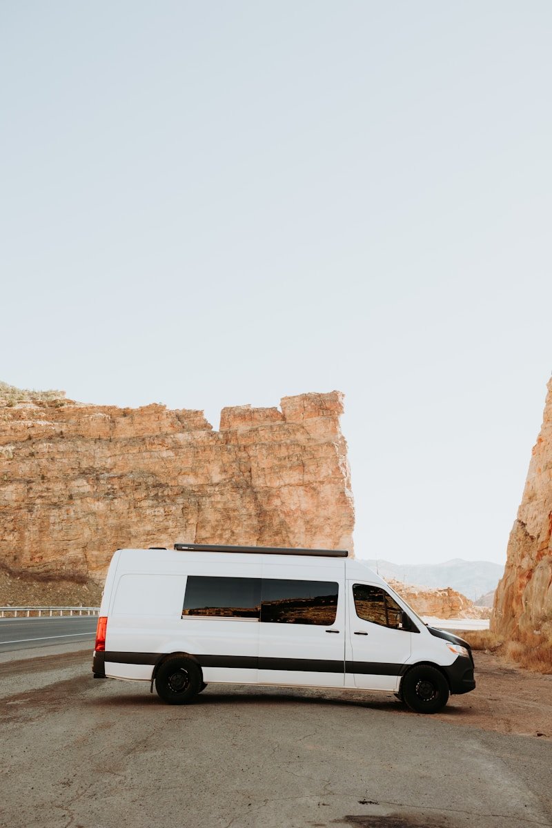 a white van parked on the side of the road