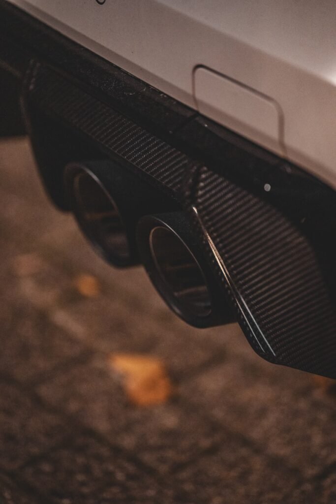 Close-up of a car's dual exhaust pipes