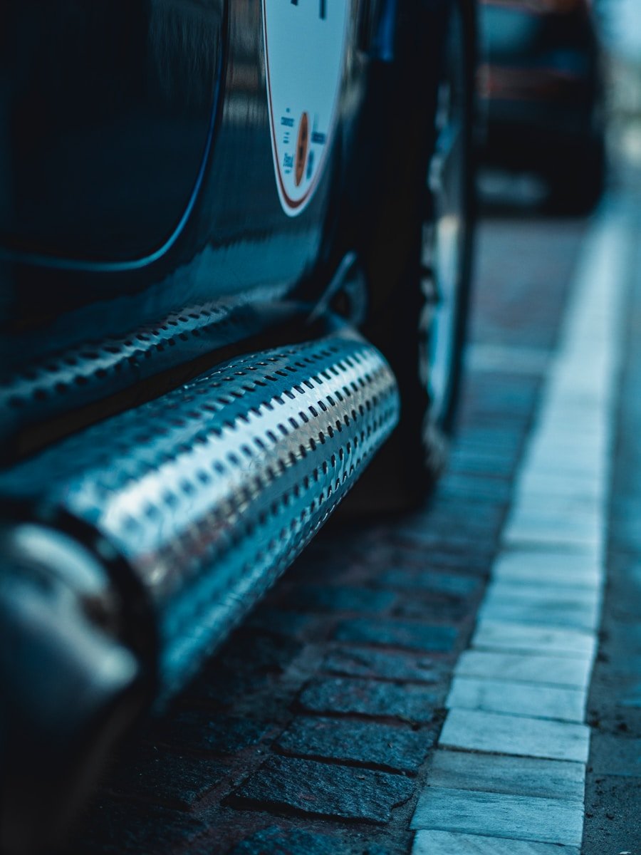 black vehicle on brick road