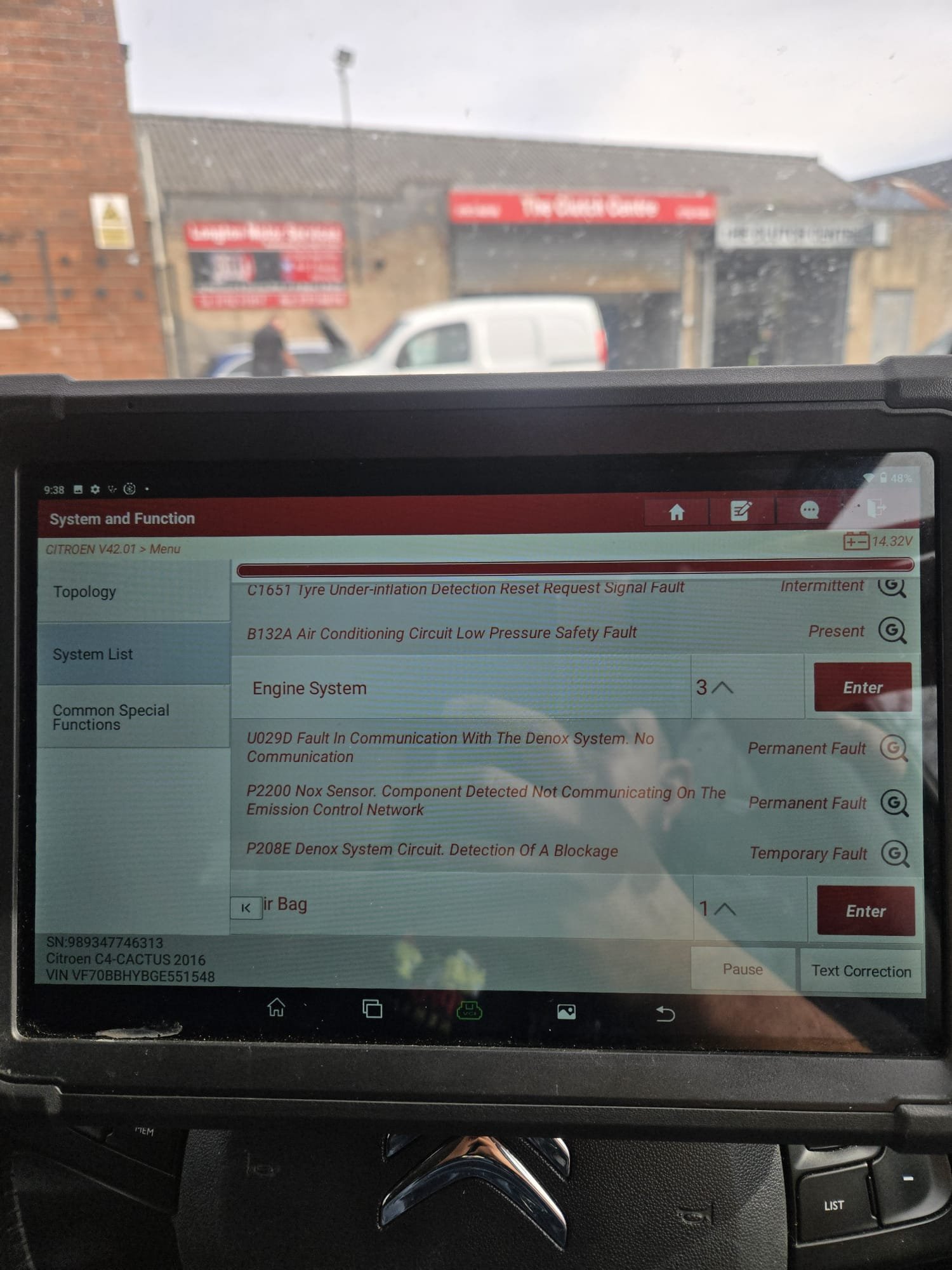 Diagnostic tablet showing Citroen Denox and NOx sensor faults P2200 and P208E
