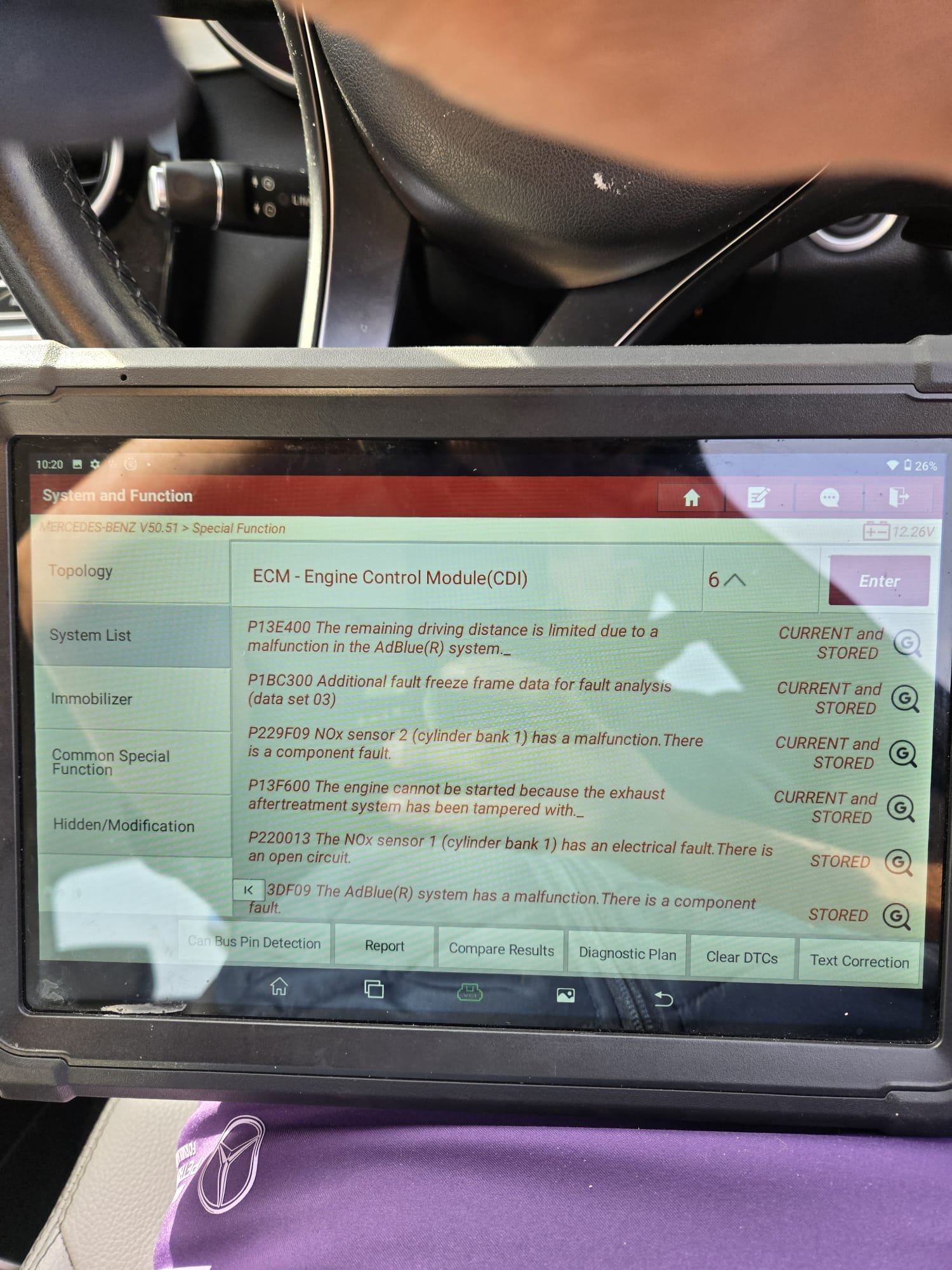 Diagnostic tablet showing Mercedes urea/AdBlue fault codes during a mobile urea delete by AdBlue Specialist
