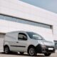 AdBlue fleet management - an unbranded white panel van parked outside a commercial building