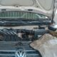 AdBlue delete insurance — diesel engine bay being inspected with a diagnostic scan tool